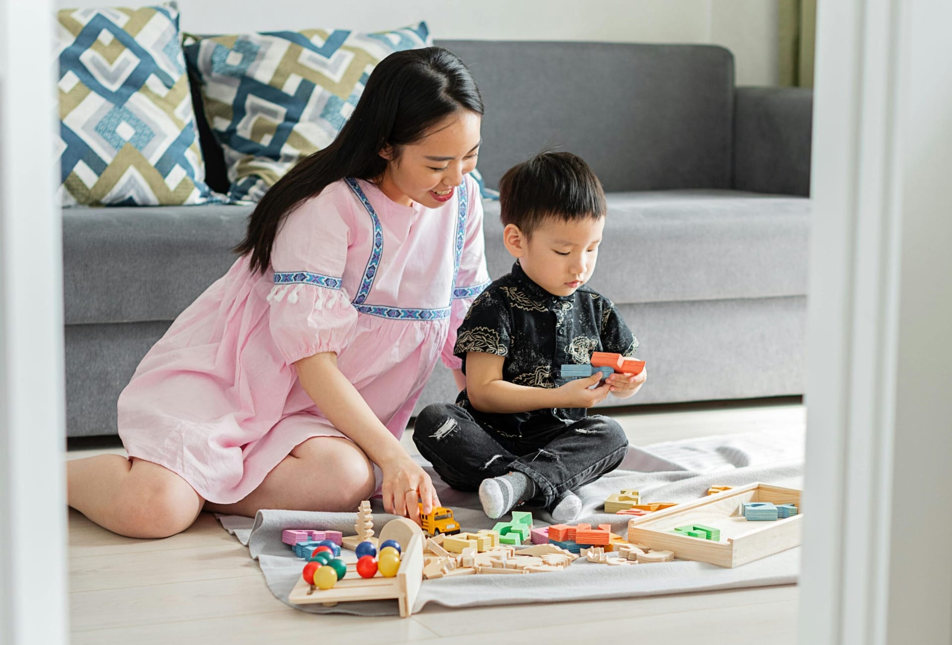 Mom and toddler playing